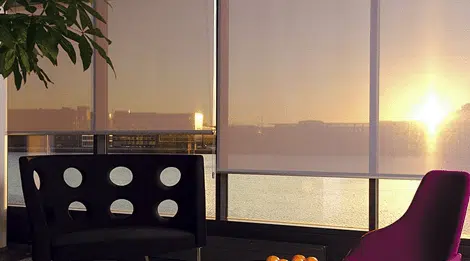 How Do Sunscreen Roller Blinds Improve Daytime Privacy, Glare Control, Uv Protection, and Heat Reduction While Keeping Your View?